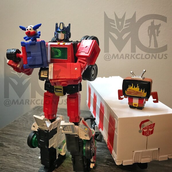 Official In Hand Image Transformers Holiday Optimus Prime Design  (1 of 10)